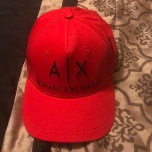 Red Armani exchange hat. Fits all sizes.